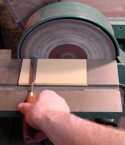 A disk sander can be used to quickly straighten up a chipped or severely worn edge A disk sander can be used to quickly straighten up a chipped or severely worn edge